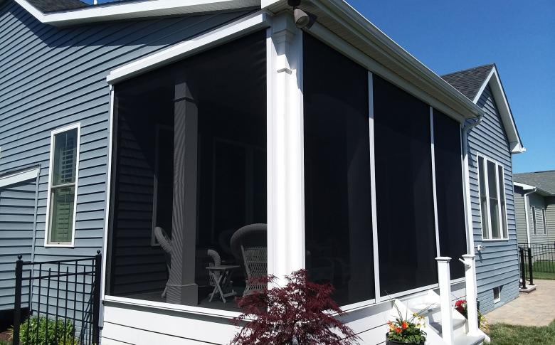 Zip Tex motorized insect screen enclosing a porch